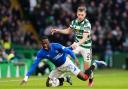 Celtic left back Alistair Johnston tussles with Rangers forward Abdallah Sima at Parkhead today