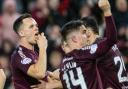 Lawrence Shankland bites pie thrown from stands after penalty strike