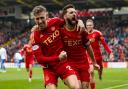 Aberdeen captain Graeme Shinnie, right, celebrates his goal against Kilmarnock in the Scottish Gas Scottish Cup quarter-final at Pittodrie today