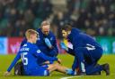 Ross McCausland receives treatment from Rangers medical staff during the Scottish Cup game against Hibernian at Easter Road earlier this month