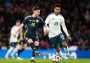 Scotland's Billy Gilmour (left) and Northern Ireland's Jamie Reid battle for the bal