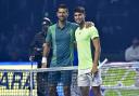 Novak Djokovic (L) and Carlos Alcaraz pose for a picture ahead of their Riyadh Season Tennis Cup exhibition tournament match in the Saudi capital last December