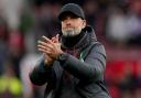 Jurgen Klopp is happy with Liverpool’s Premier League situation after the draw at Manchester United (Martin Rickett/PA)