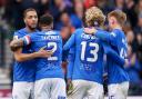 Cyriel Dessers, left, celebrates Rangers' win over Hearts in the Scottish Gas Scottish Cup semi-final yesterday with his team mates