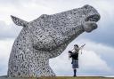 Piper Mark Sutherland, from Larbet, plays during a special event day to celebrate the 10th anniversary of the Kelpies sculpture in Falkirk