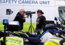 Bikers Chas McLeod, left, and Jock McGaughey from South Queensferry check out the new speed camera to be deployed by Police Scotland motorcycle division in 2016 (stock pic)
