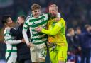 GLASGOW, SCOTLAND - NOVEMBER 05: Celtic's Arne Engels and Kasper Schmeichel at full time during a UEFA Champions League 2024/25 League Phase MD4 match between Celtic and RB Leipzig at Celtic Park, on November 05, 2024, in Glasgow, Scotland. (Photo by