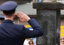 A man salutes during Anzac Day commemorations in Nelson Bay, New Zealand (Mark Baker/AP)
