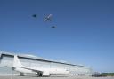 Flypast of a Poseidon MRA1 and two Typhoon aircraft at RAF Lossiemouth.