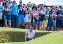 Rory McIlroy salvages a par on his final hole from the bunker at the Genesis Scottish Open