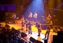 Graeme Stafford, Peter Tickell, Peter Morrison, Paul Towndrow, Adam Sutherland, Innes Hutton, Iain Copeland and Tom Salter of the Peatbog Faeries perform on stage on day 1 of the Big Session Festival at De Montfort Hall And Gardens on June 19, 2009 in