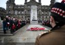 Crowds gather in George Square for one of many services across Scotland to mark centenary of Armistice Day