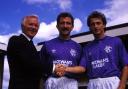 Trevor Francis (right) is welcomed by Ibrox by chairman David Holmes and player/manager Graeme Souness