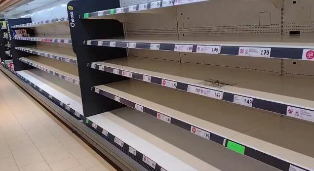 Empty shelves at a supermarket in the UK