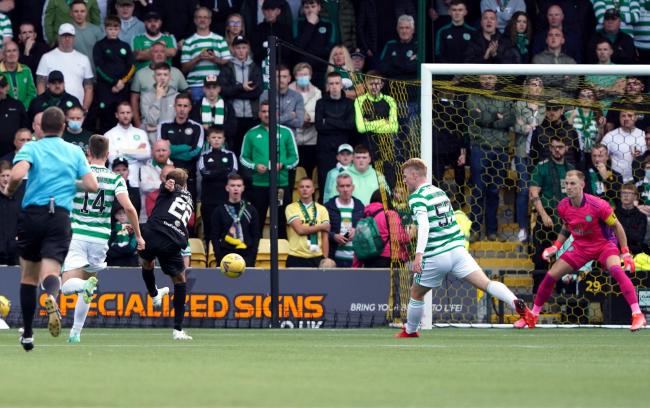 Andrew Shinnie slams home the winner for Livingston against Celtic.