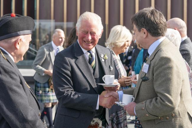 Prince Charles and Camilla presented with Robert the Bruce sword at art gallery opening