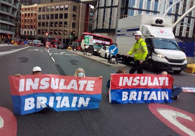 Insulate Britain of protesters from Insulate Britain blocking Old Street roundabout in central London