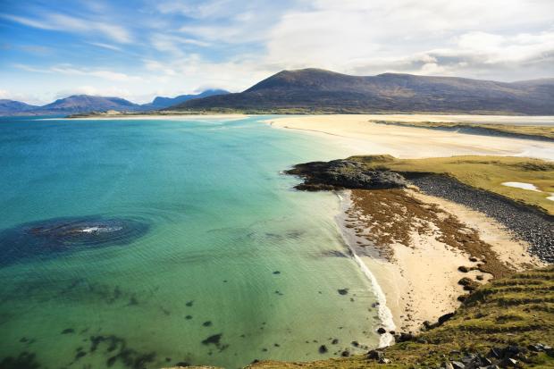 HeraldScotland: Seilebost Beach on Harris looking over the Sound of Taransay and the Atlantic Ocean. Picture: Martin McCarthy/Getty