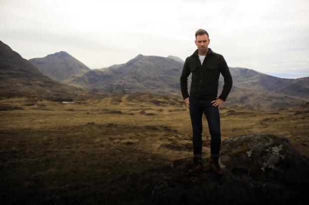 HeraldScotland: Presenter James Crawford during filming of Scotland from the Sky. Picture: BBC Studios