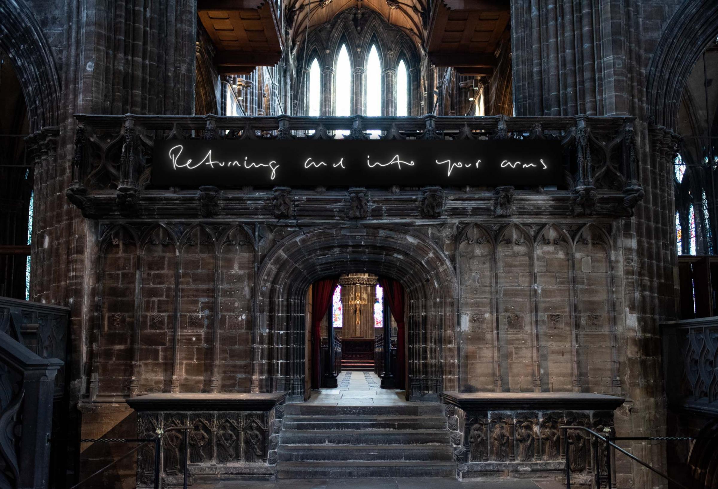 The neon light artwork has been unveiled at Glasgow Cathedral