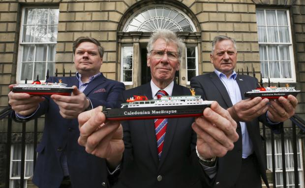 HeraldScotland: Alba Party members Kenny Macaskill flanked by Councillors Chris and Jim McEleny at Bute House friday to deliver model Cal Mac ferries to help save the fleet. STY..Pic Gordon Terris Herald & Times..24/9/21.