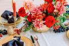 A festive tablescape created by Blooming Haus master florist Michal Kowalski and his business partner Michael Dariane