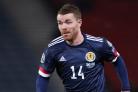 Sheffield United and Scotland star John Fleck “conscious and talking” after medical incident