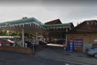 Two people dressed in dark clothing targeted the machine at a filling station on Glasgow Road (Pic:Google)