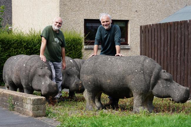Stan and Mark Bonnar in Glenrothes with the concrete hippos made by Stan in the 1970s. Picture: BBC/Objective Media