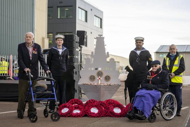 HeraldScotland: Employees are joined by HMS Glasgow Ships Company and veterans from Erskine Hospital to mark Armistice Day