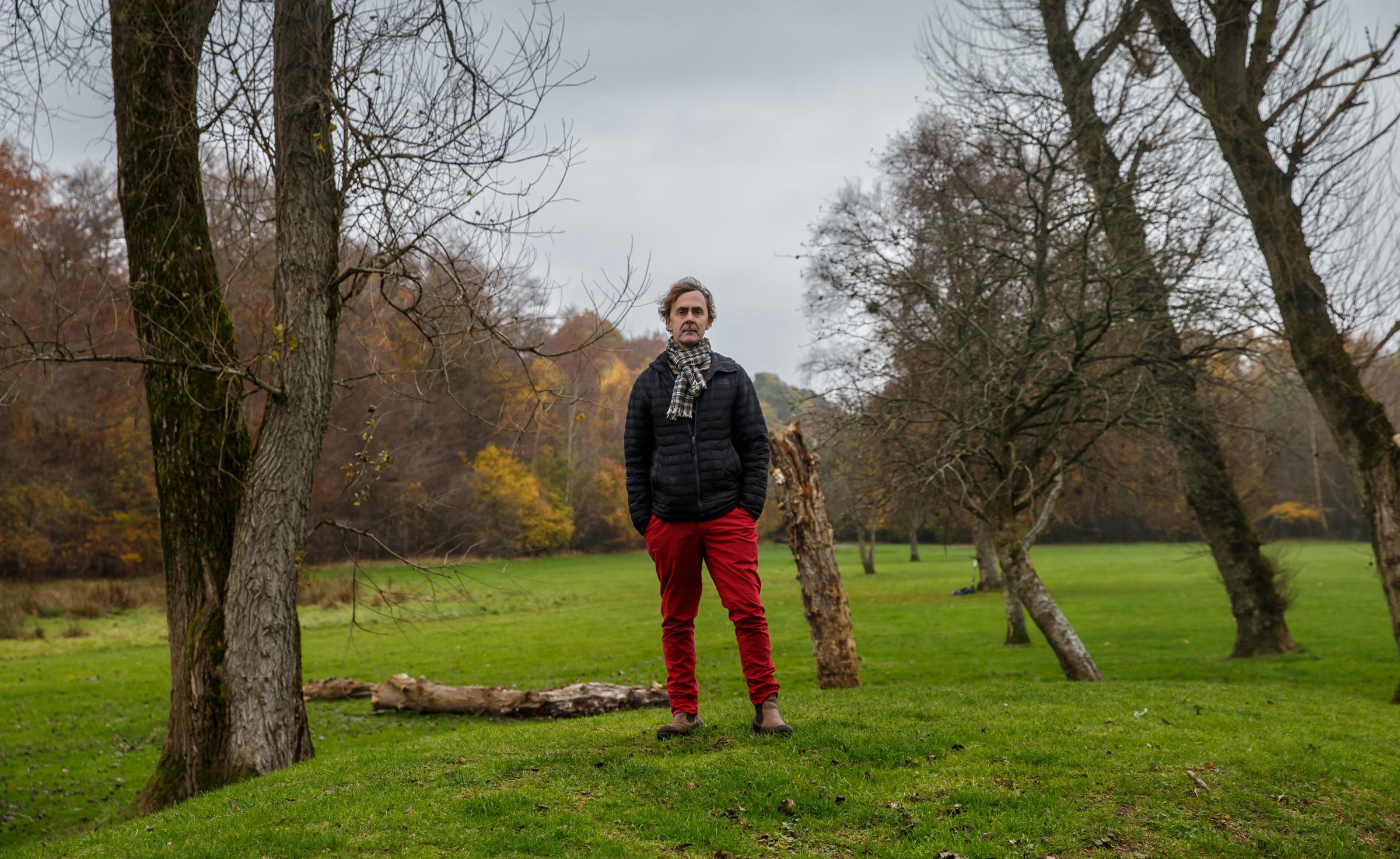 Artist Alec Finlay pictured at what will become the Riverside Grove, part of Scotlands Covid Memorial at Pollok Country Park. Photograph by Colin Mearns.