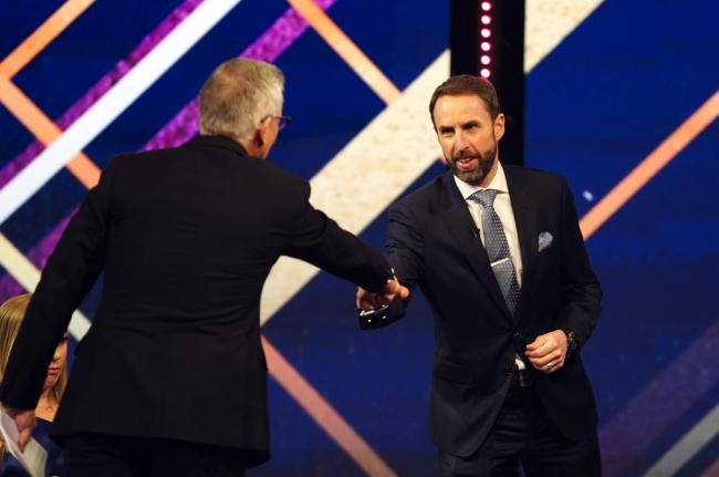 Gareth Southgate, Manager of the Year, receives the Team award on behalf of the Men's England Football Team from Gary Lineker during the BBC Sports Personality of the Year Awards on Sunday