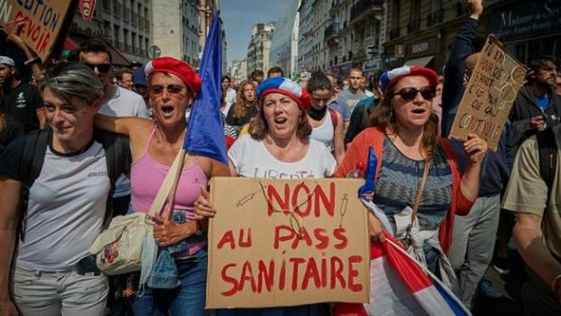 HeraldScotland: Protesters in Paris campaign against the introduction of the country's Covid 'health pass'. A similar scheme would later be adopted in Scotland