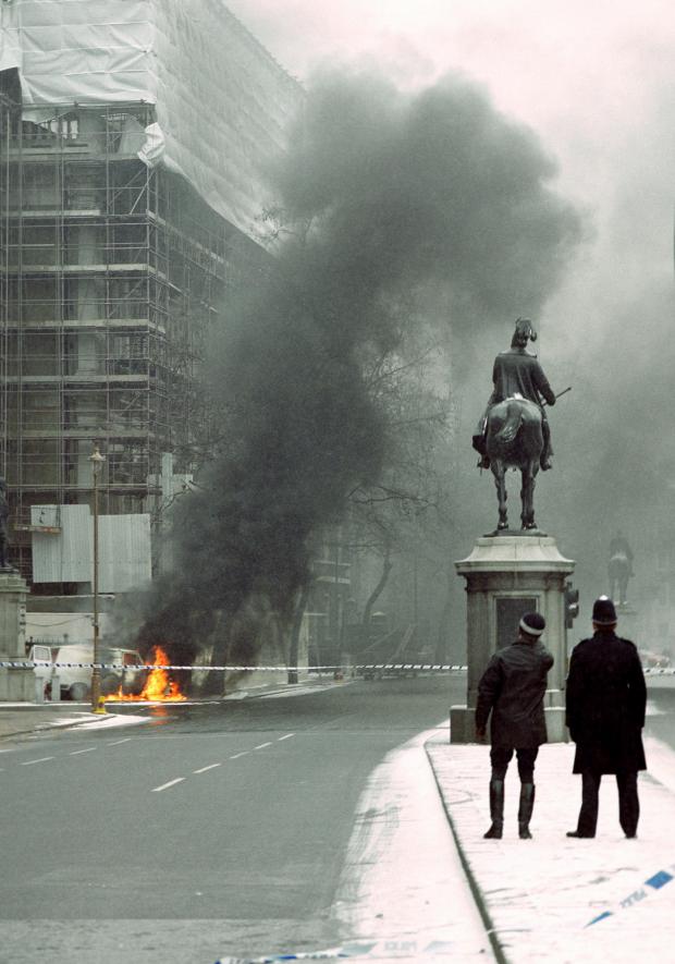 HeraldScotland: A white van burning outside the Banqueting House in Whitehall after an attempted mortar bomb attack on Downing Street