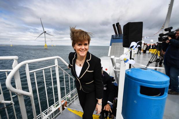 HeraldScotland: Nicola Sturgeon at the launch of the European Offshore Deployment Centre in Aberdeen Bay in 2018 Picture: Getty 