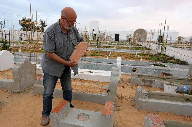 HeraldScotland: The Algerian artist Rachid Koraichi at the cemetery for migrants he calls Le Jardin d’Afrique, or Garden of Africa, in southeastern Tunisia. (Fathi Nasri/Agence France-Presse — Getty Images)