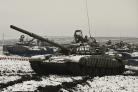 Russian tanks T-72B3 take part in drills at the Kadamovskiy firing range in the Rostov region in southern Russia, Wednesday, Jan. 12, 2022. Russia has rejected Western complaints about its troop buildup near Ukraine, saying it deploys them wherever it
