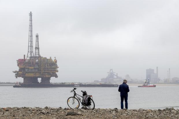 HeraldScotland: The giant Brent Alpha platform is being decommissioned on Teesside Picture: Shell