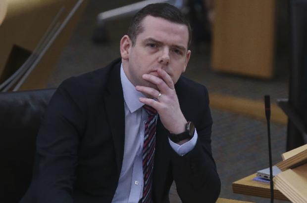 HeraldScotland: Scottish Conservative leader Douglas Ross urged ministers to set a date for the removal of face masks in classrooms.