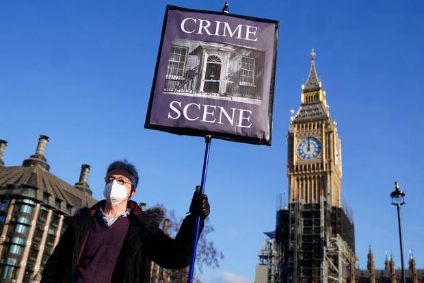 A protestor in Parliament Square, London, yesterday
