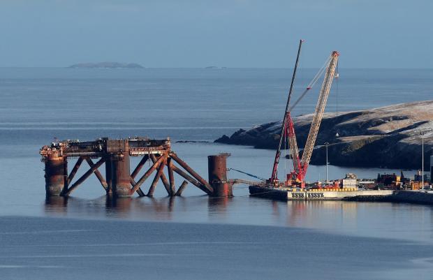 HeraldScotland: Decommissioning work in progress in Shetland Picture Andrew Milligan/PA