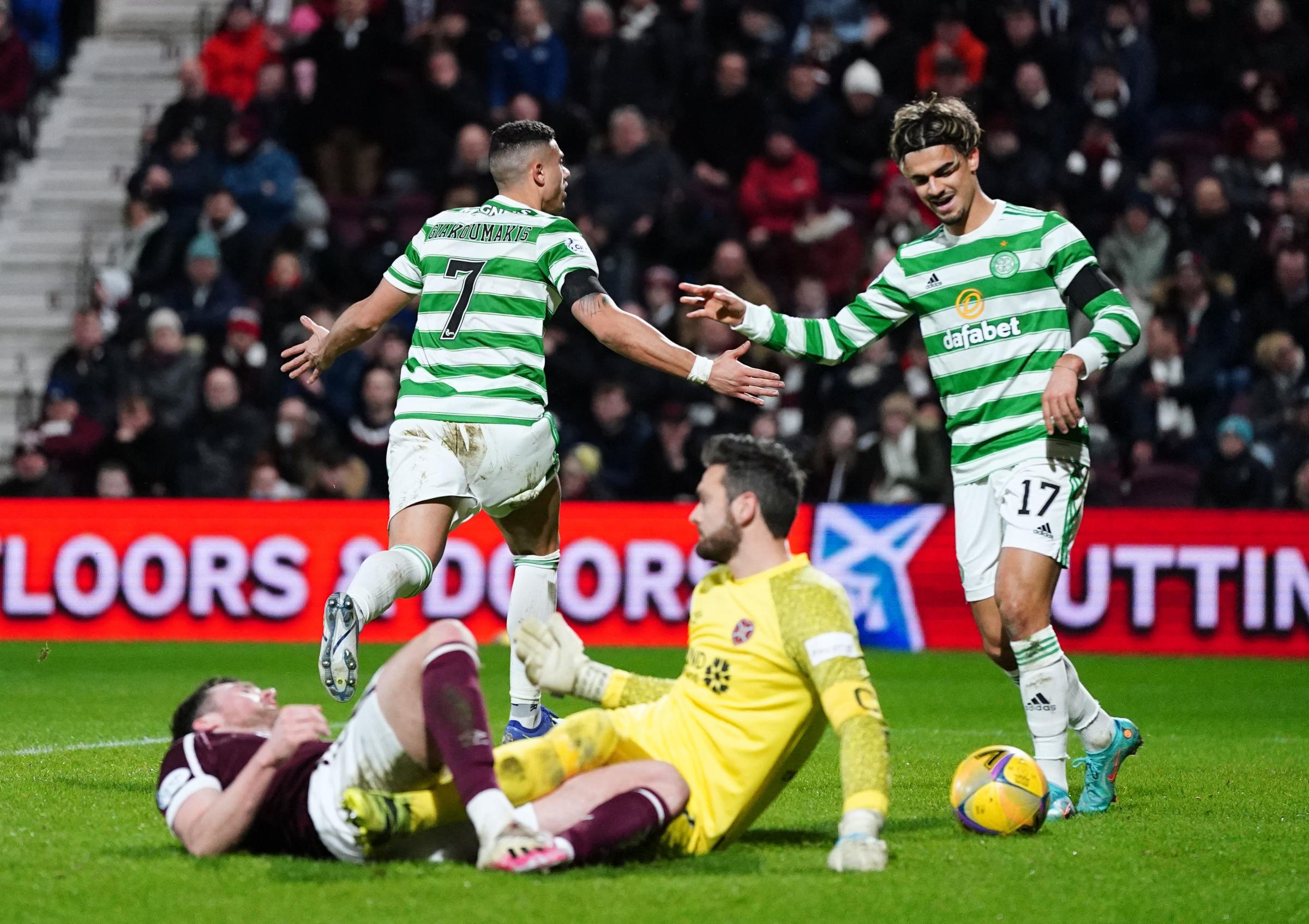 Celtics Georgios Giakoumakis (left) celebrates scoring his sides second goal with Joao Pedro Jota (right) during the cinch Premiership match at Tynecastle Park, Edinburgh. Picture date: Wednesday January 26, 2022. PA Photo. See PA story SOCCER Hearts.