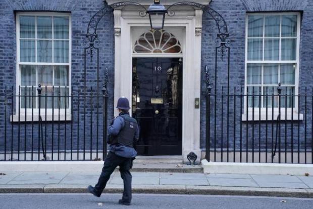 HeraldScotland: A police officer outside 10 Downing Street