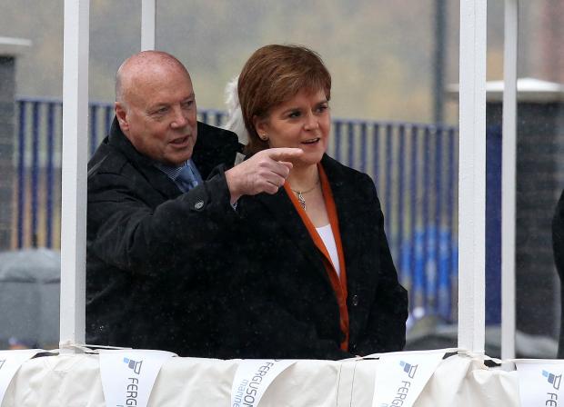 HeraldScotland: First Minister Nicola Sturgeon with Jim McColl at a launch ceremony for the liquefied natural gas passenger ferry MV Glen Sannox, the UK's first LNG ferry, at Ferguson Marine Engineering in Port Glasgow. PRESS ASSOCIATION Photo. Picture date: Tuesday
