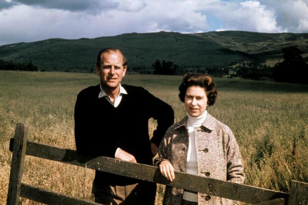 HeraldScotland: File photo dated 01/09/72 of the Duke of Edinburgh and Queen Elizabeth II at Balmoral celebrating their Silver Wedding anniversary. The Duke of Edinburgh has died, Buckingham Palace has announced. Issue date: Friday April 9, 2020.. See PA story DEATH