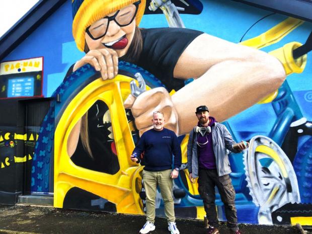 HeraldScotland: Owner Dave Neil with artist Bmoresketchy