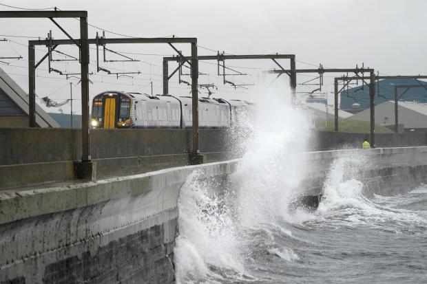 HeraldScotland: Waves crash against the sea wall at Saltcoats in North Ayrshire before Storm Dudley hits the north of England/southern Scotland from Wednesday night into Thursday morning, closely followed by Storm Eunice, which will bring strong winds and the