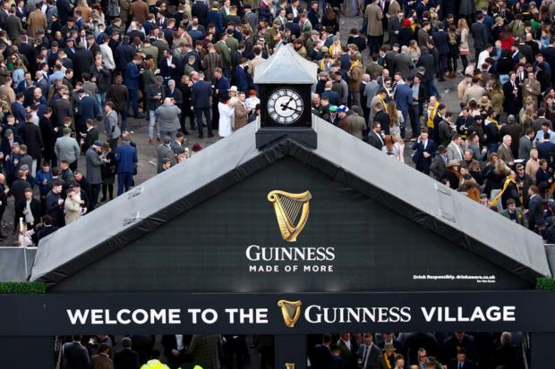 HeraldScotland: The Guinness Village is always a popular hang-out at the Cheltenham Festival.(Tim Goode/PA)