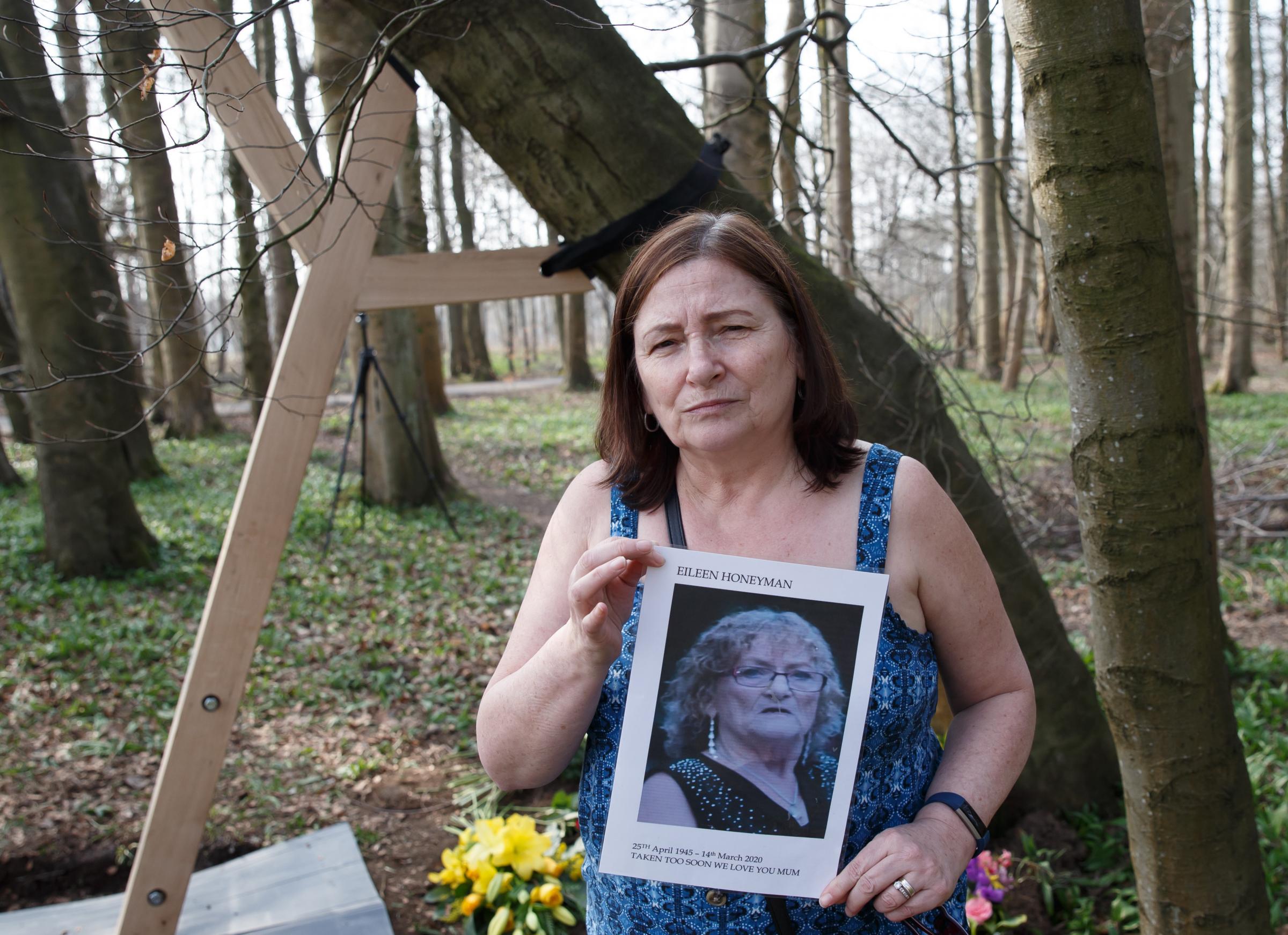 Marion McDonald who lost her mum Eileen Honeyman to Covid on the 14 March 2020. Marion is pictured at Pollok Country Park on the second anniversary of the first Covid lockdown. Photograph by Colin Mearns.
