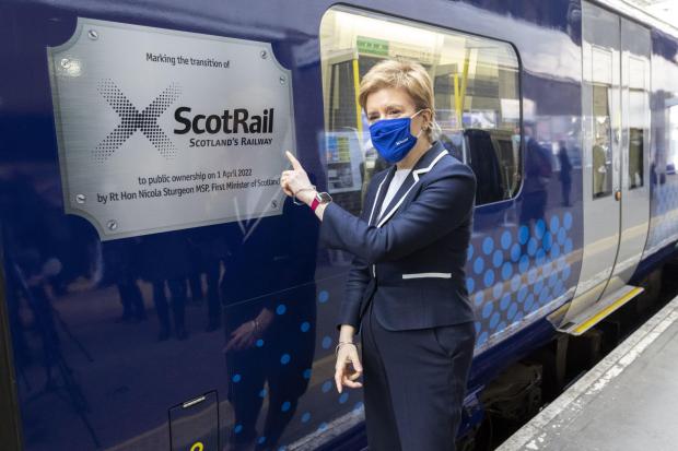 Nicola Sturgeon unveils a plaque marking ScotRail’s move into public ownership (Robert Perry/PA Wire)